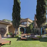 Capital O La Huerta Golf & Hotel