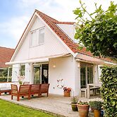 Nice Holiday Home on the Water in Grou