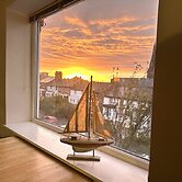 Bright Seaside Apartment With Stunning River Views