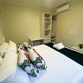 Casa com churrasqueira Ar e 2 quartos