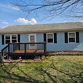 Blue Cottage With Game Room Deck & Hot Tub