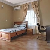 Wig and Gown Apartment