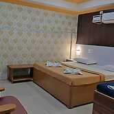 Fabhotel Amutham Residency