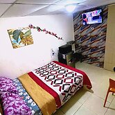 Habitación con entrada Privada en Playa Dorada + Kitchenette y baño.