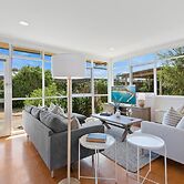 Spacious Coastal 4-bed Steps From the Sand