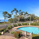 Bright Coastal Stay With Pool and Beach View