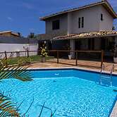 Casa com Wi-fi Piscina e Garagem a 550m da Praia