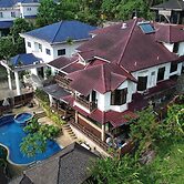 Serene Palm Heritage Tropical Villa