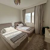 Cozy Retreat in Madinty & Work-Station