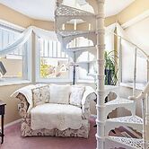 Charming Victorian Home in Okotoks Elegant Comfort & Modern Convenienc
