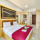 Wood Accents Studio At Grand Dharmahusada Lagoon Apartment