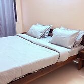 Cozy Den Hotel