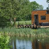 Tiny House by the Pond: Terrace, Barbecue, Outdoor Fireplace