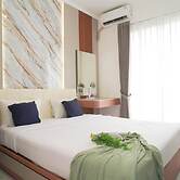 Bright And Homey Studio Room At Apartment Sky House Bsd