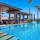 Mountain-view Apartment Near Beach With Balcony, Rooftop Pool, Gym, & 