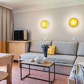 Chic Riverfront Stay With Balcony