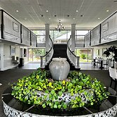 At Home Inn & Suites