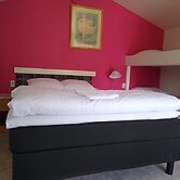 Milano Garden - City Bungalow Hotell, i gränssnittet till Kullabygdens