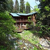 Log Cabin on the Stream