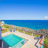 Stunning Coral View Home with Oceanfront Pool by RedAwning
