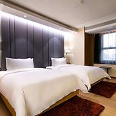 KuanRong Luxury Suites Hotel - Daping Times Square