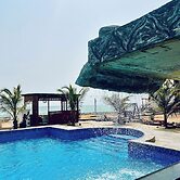 Coconut Pointe Villa & Beach Resort