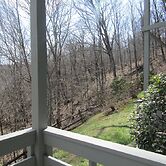 High Ceiling Skyleaf A9 Condo with Fireplace by RedAwning