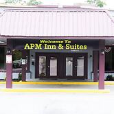 Apm Inn & Suites