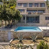 Beachfront Villa Poseidon with Heated Pool