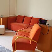 Cosy studio in front of a small church