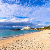 Mr.KINJO in front of Manza Beach
