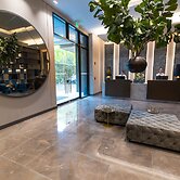 York Medellin, Curio Collection by Hilton