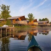 Campsite - Combined Tents With Kitchen and Bathroom Located Near a Pon