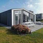 Cozy Chalet with Fireplace near Oosterschelde