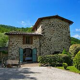 Holiday House with Pool & Large Garden Overlooking Lake near Tuscany