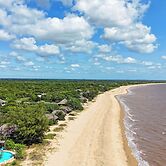 Saadani Safari Lodge - bush, river, beach
