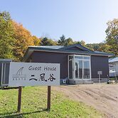 Guesthouse Nibutani Yanto - Hostel