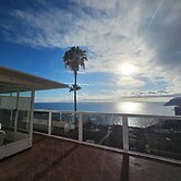 Sunset Balcony With Ocean Views and Pool Access