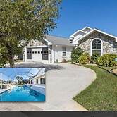 Peaceful Waterfront Pool Home 3 Bedroom Home by RedAwning