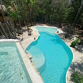 Aldea Maya-Ha Cabañas con cenotes