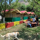 Tirthan Village Huts