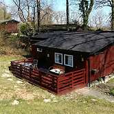 Nuthatch Lodge is set in 24 Acres of Wood, Parkland Near the Village o