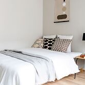 Bright studio by Logomo & Train station