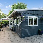 Lovely Wooden Chalet With Garden in Reutum