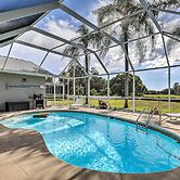 Palm Harbor Home w/ Pool & Golf Course Views!