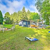 Riverfront Home w/ Dock ~ 6 Mi to Cheboygan!