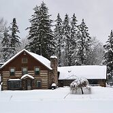 Log Cabin on the Wolf River w/ Private Hot Tub!