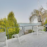 Lakefront De Tour Village Home w/ Deck & Fire Pit!