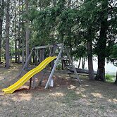 Cozy Interlochen Cabin w/ Dock: 1 Mi to Green Lake