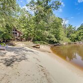 Riverfront Cabin w/ Outdoor Oasis in Seminary!